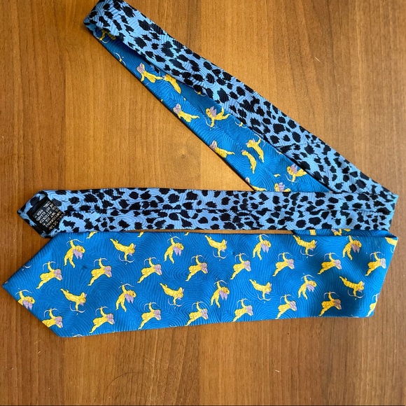 Blue Gianni Versace tie with Gold Cupid pattern. - Picture 1 of 5